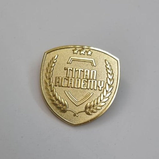 Titan academy pin
